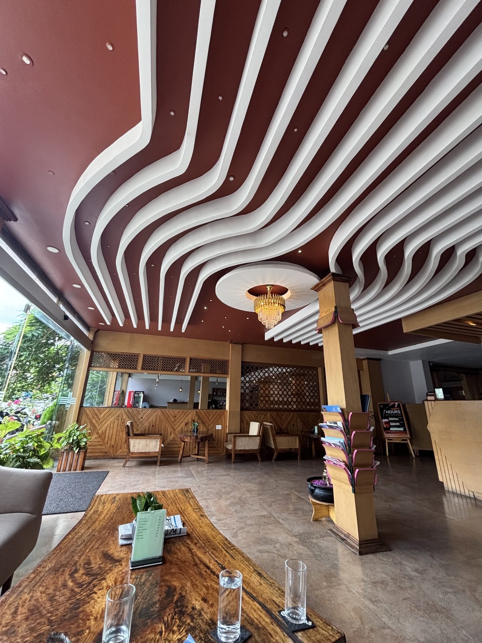 Interior with sculpted timber ceiling